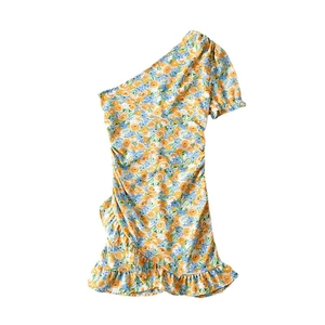 Floral off-shoulder mini dress with puff sleeve and ruffled hem on white background