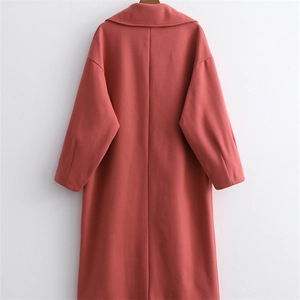 Rear view of a terracotta long wool coat with notched lapel and drop shoulder design