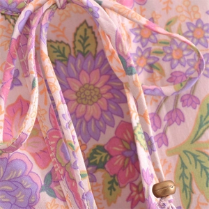 Boho V-neck floral midi dress in light pink rayon with tassel drawstring detail