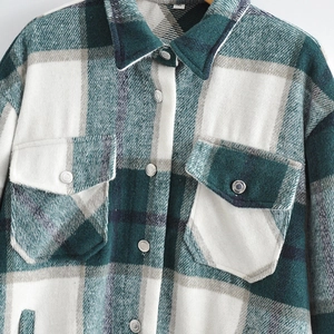Plaid wool-like shirt jacket in green and white check with chest pockets and metal buttons