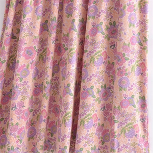 Bohemian floral V-neck midi dress in pink rayon with vintage ethnic print detail