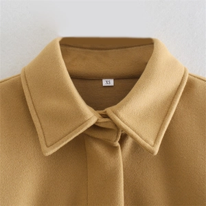 Camel oversized wool jacket with lapel collar and dense stitching detail