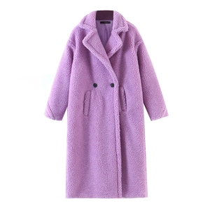 Close-up of premium purple teddy coat fabric with stylish buttons and lapel detail