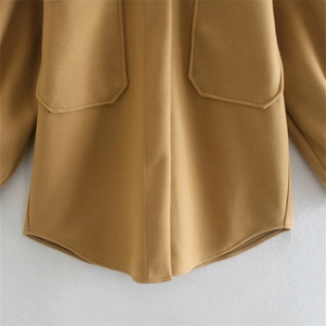Minimalist camel wool lapel shirt jacket with large flap pockets and rounded hemline