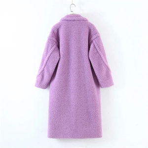 Close-up of purple long plush coat featuring thick faux shearling texture and notch lapel