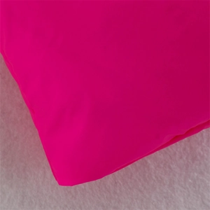 Detail shot of the rose pink vest fabric and clean edge stitching on the stand collar