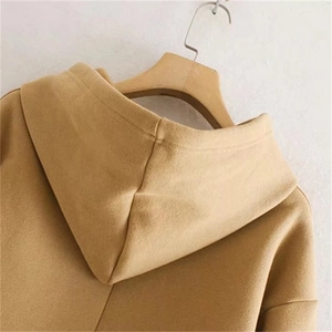 Minimalist camel fleece hoodie for women with detailed stitching and soft wool texture