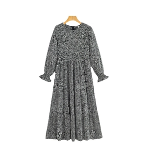 Polka dot long sleeve tiered maxi dress with round neck and ruffle elastic cuffs