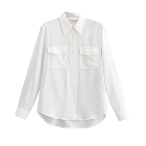 Women white long sleeve button down shirt with front flap pockets and curved hemline