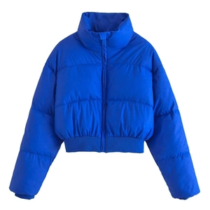 Women's minimalist blue puffer jacket with high collar and ribbed cuffs in short style