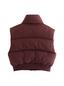 Women's dark red puffer vest with high stand collar and quilted design in back view
