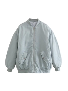 Detail view of M-sized light blue bomber jacket featuring silver zipper and ribbed cuffs