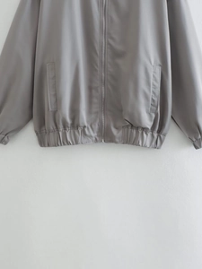 Unisex grey Y2K flight jacket with metallic zipper and sleek elastic cuffs