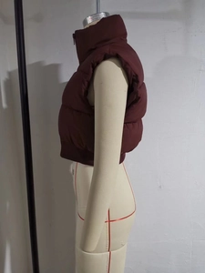 Slim fit burgundy quilted puffer vest for women with stand collar and ribbed hemline