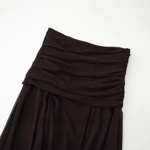 High-waist brown ruched pleated midi skirt with translucent lightweight fabric texture