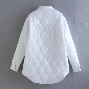 Minimalist white quilted button-down jacket with onion-stitch pattern and curved hem