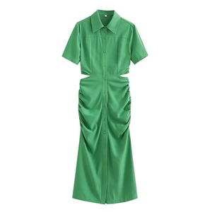Close-up of grass green shirt dress featuring waist cut-outs and gathered ruched details