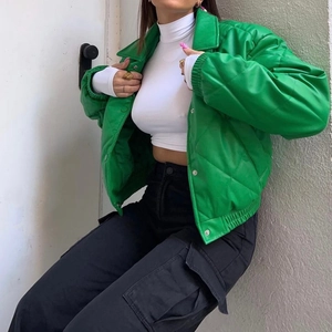 Women green quilted faux leather jacket with diamond pattern and metal snap buttons