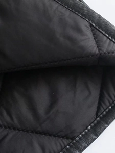 Women's black PU leather quilted mid-length coat featuring detailed inner lining stitch work