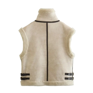 Back view of a fleece-lined beige vest with contrasting leather straps and high collar detail