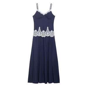 Detail of the white lace embroidery on the navy blue striped long camisole dress
