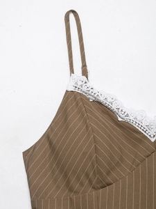 Detail of brown striped camisole top with white lace neckline and thin straps