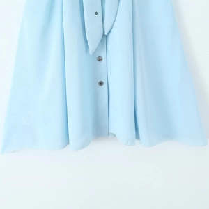 Women's light blue halter V-neck dress with buttons and chic bow tie detail