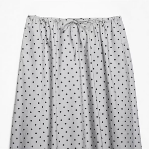 Polka dot mini skirt with drawstring waist in light grey and black pattern