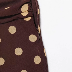 Polka dot asymmetrical skirt in burgundy with side hidden zipper and ruched details
