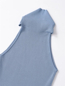 Detailed macro view of the light blue ribbed knit texture and turtleneck design collar