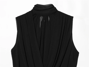 Detail of black pleated sleeveless top with V-neckline and breathable chiffon fabric