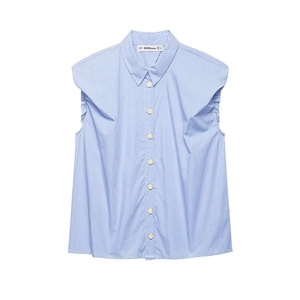 Close-up of blue and white gingham sleeveless shirt featuring classic collar and white buttons