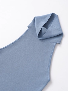 Detailed close-up of blue ribbed knit turtleneck sleeveless top with fine texture
