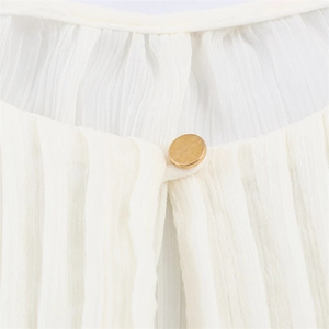 Elegant white pleated blouse for women with a round gold decorative button detail