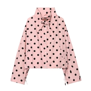 Detail of light pink polka dot jacket with high collar and adjustable black drawstrings