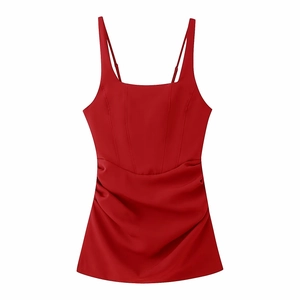 Detail of red corset-style mini dress with square neckline and slimming vertical seams