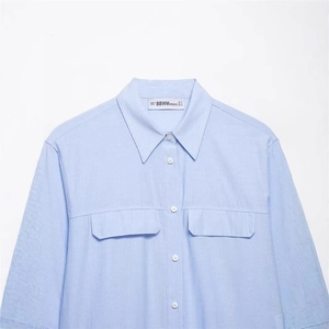 Women's light blue striped poplin shirt with bow detail and twin chest pockets
