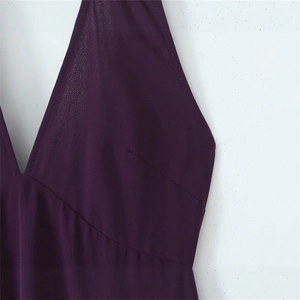 Elegant slim-fit dark purple halter neck dress with a minimalist deep V-neckline design