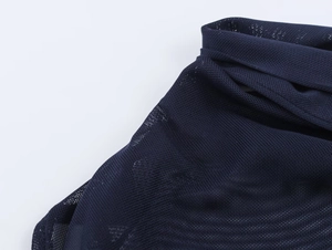 Detailed macro view of dark blue fine mesh fabric texture and high-quality sewing on the neckline