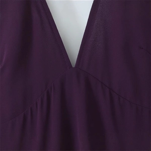 Elegant deep purple V-neck French dress with pleated details and slim fit design