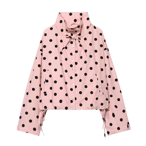 Pink cropped jacket with black polka dots featuring stand collar and adjustable drawstring