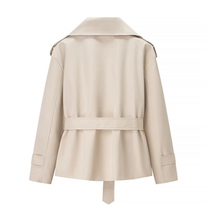 Rear view of a short beige trench jacket featuring a belted waist and classic epaulettes