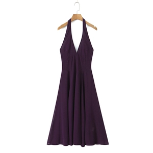 Elegant deep purple halter neck dress with slim waist and flowing A-line silhouette