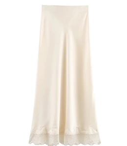 Detail shot of champagne satin midi skirt with elegant lace trim at the bottom hem