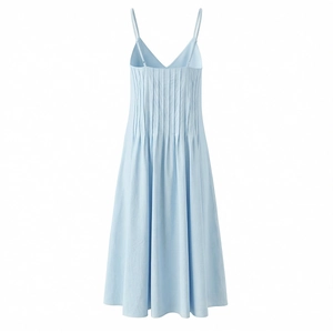 Detailed view of the light blue pleated bodice and adjustable straps on the summer dress