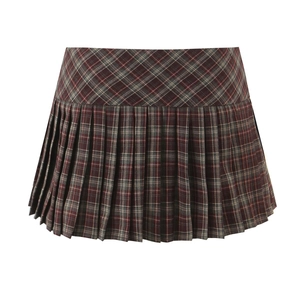 Vue détaillée de la jupe plissée à carreaux avec motif écossais marron et taille haute