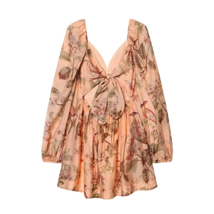 Floral A-line mini dress with puff sleeves and large bow detail on deep V-neckline
