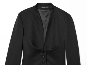 Detail of slim-fit black long-sleeve blazer featuring deep V-neck and triple button closure