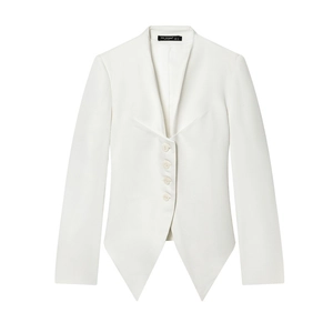Detail of white slim blazer showing asymmetrical hem and single-breasted four-button closure