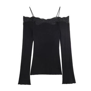 Off-shoulder black long sleeve knit top with delicate lace trim and thin shoulder straps